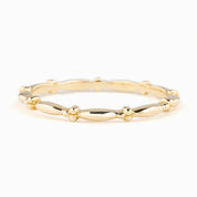 Julia Ring solid gold full eternity bead band with 1.7mm width, ethically sourced, in recyclable kraft box.