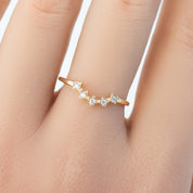 V-shaped solid gold Star Tiara Ring with five natural white diamonds on finger, ethically sourced and delicate design