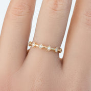 Gold Six Star Ring with natural white diamonds on finger, G color SI clarity, ethically sourced gemstones