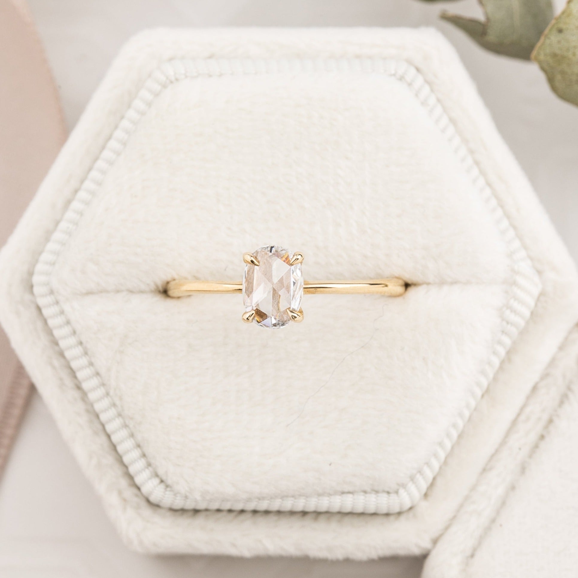 Nina Ring featuring a 0.48ct oval rose cut diamond in a 14k recycled yellow gold band, one of a kind design.