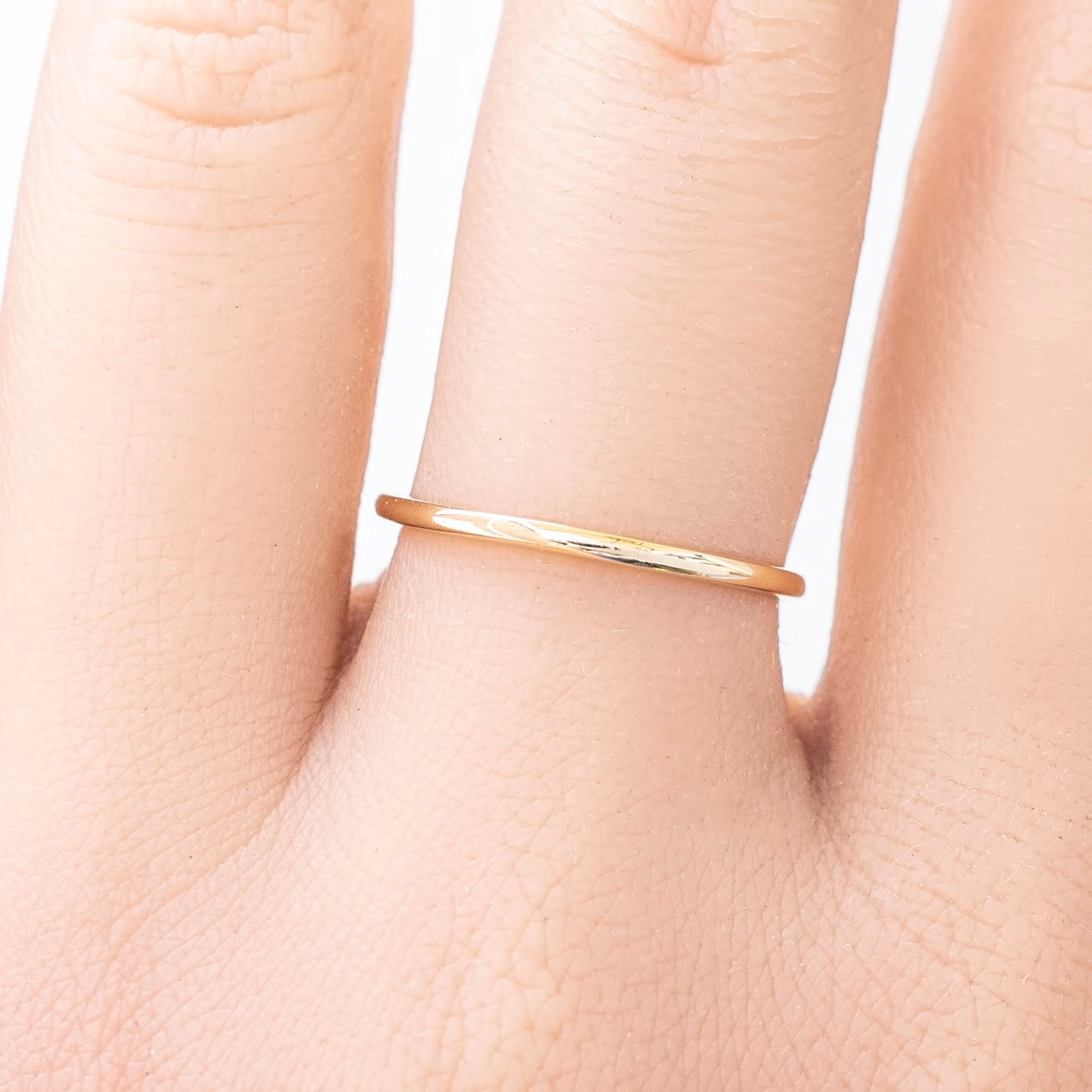 Half-Round Straight Band (1.3mm) ring on finger, handmade, ethically sourced by Envero Jewelry on Etsy.