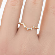 Norah's Crown Ring featuring natural white diamonds set in ethically sourced solid gold band on finger.