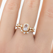 Solid gold Norah's Crown ring with natural white diamonds on finger, ethially sourced and elegant design