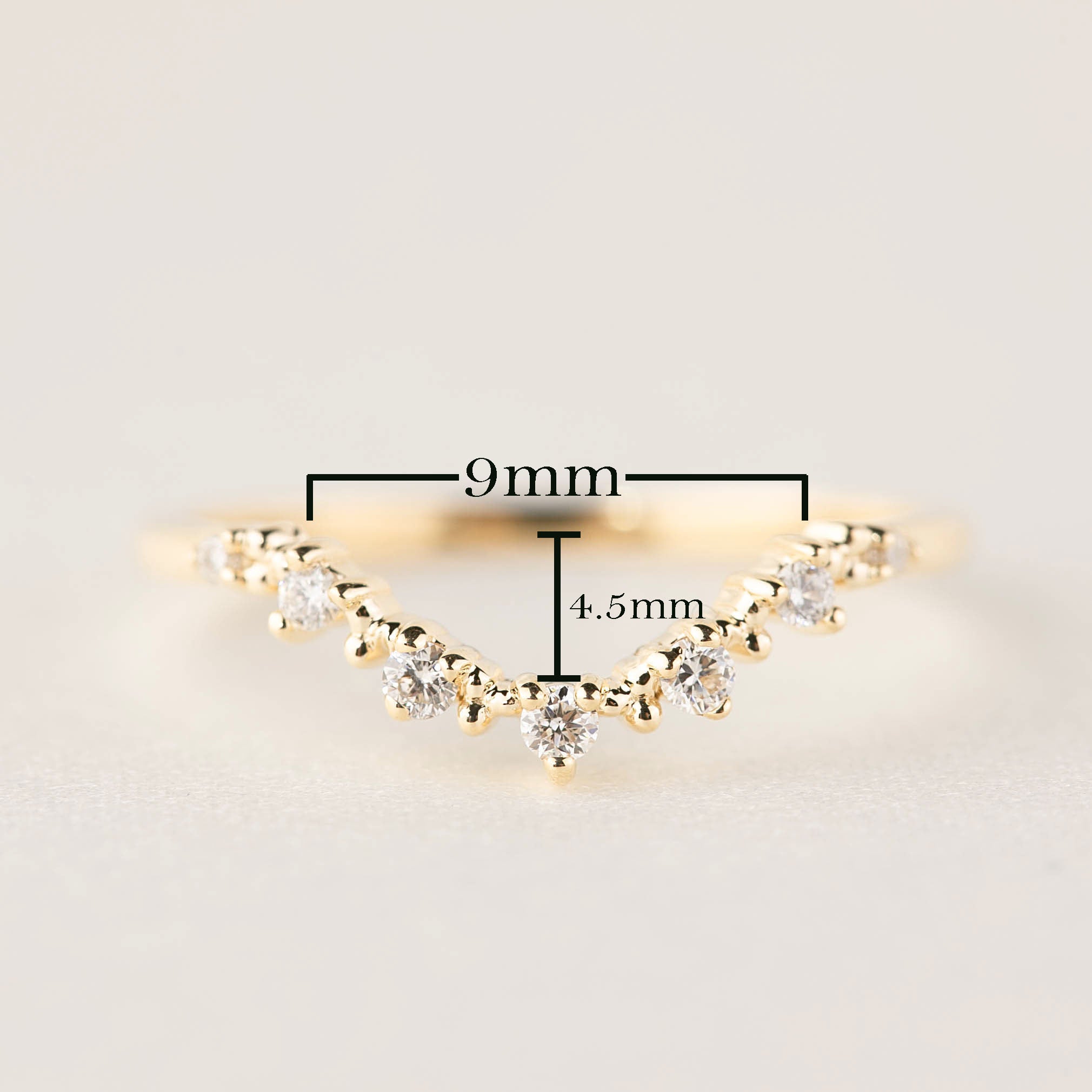 Norah Tiara Ring with V-shaped 9mm by 4.5mm band, natural white diamonds, and solid gold setting.