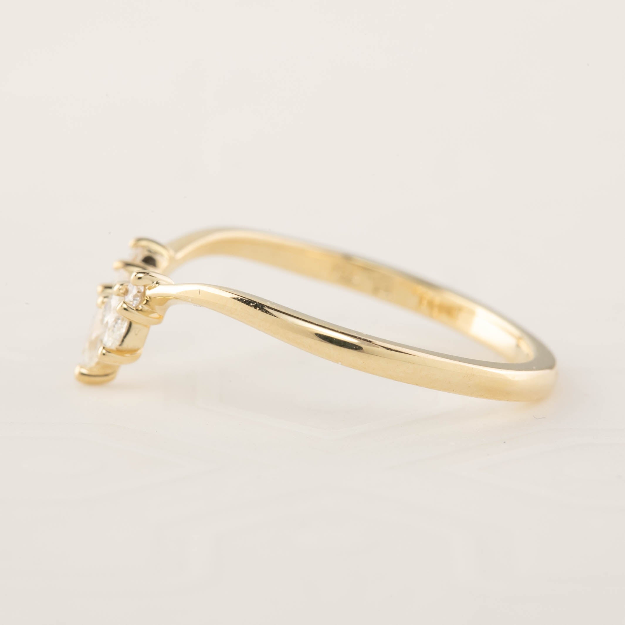Side view of Gloria Ring featuring natural white diamonds on an ethically sourced solid gold band