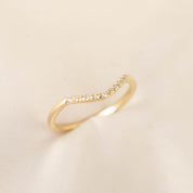 Esperanza Ring in solid gold with natural white diamonds, 0.067ctw, G color SI quality, on soft fabric background