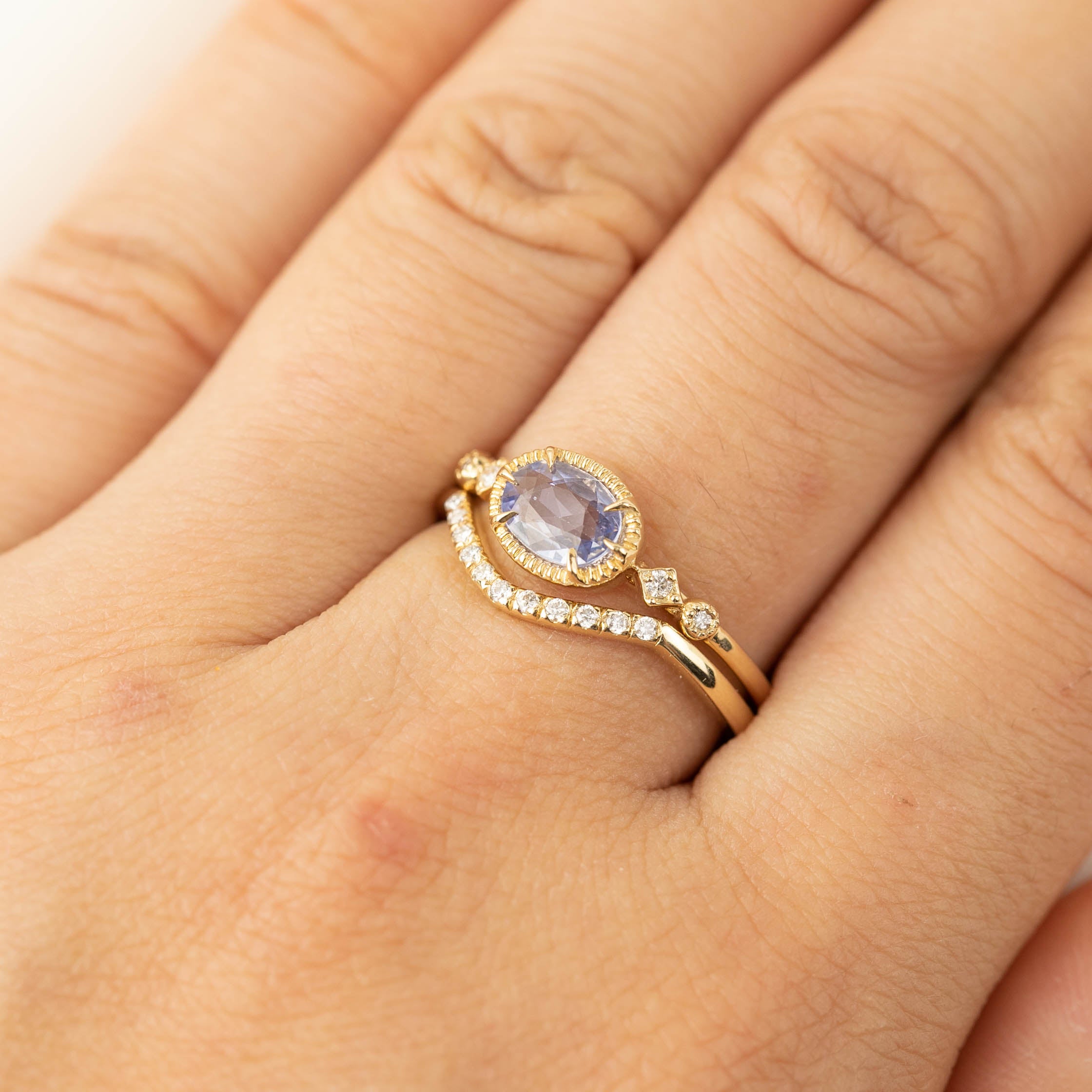 Esperanza Ring featuring natural white diamonds 0.067ctw set in a 1.5mm ethically sourced solid gold band