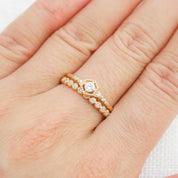Close-up of Dahlia Diamond Eternity Ring featuring natural white diamonds set in ethically sourced solid gold band.