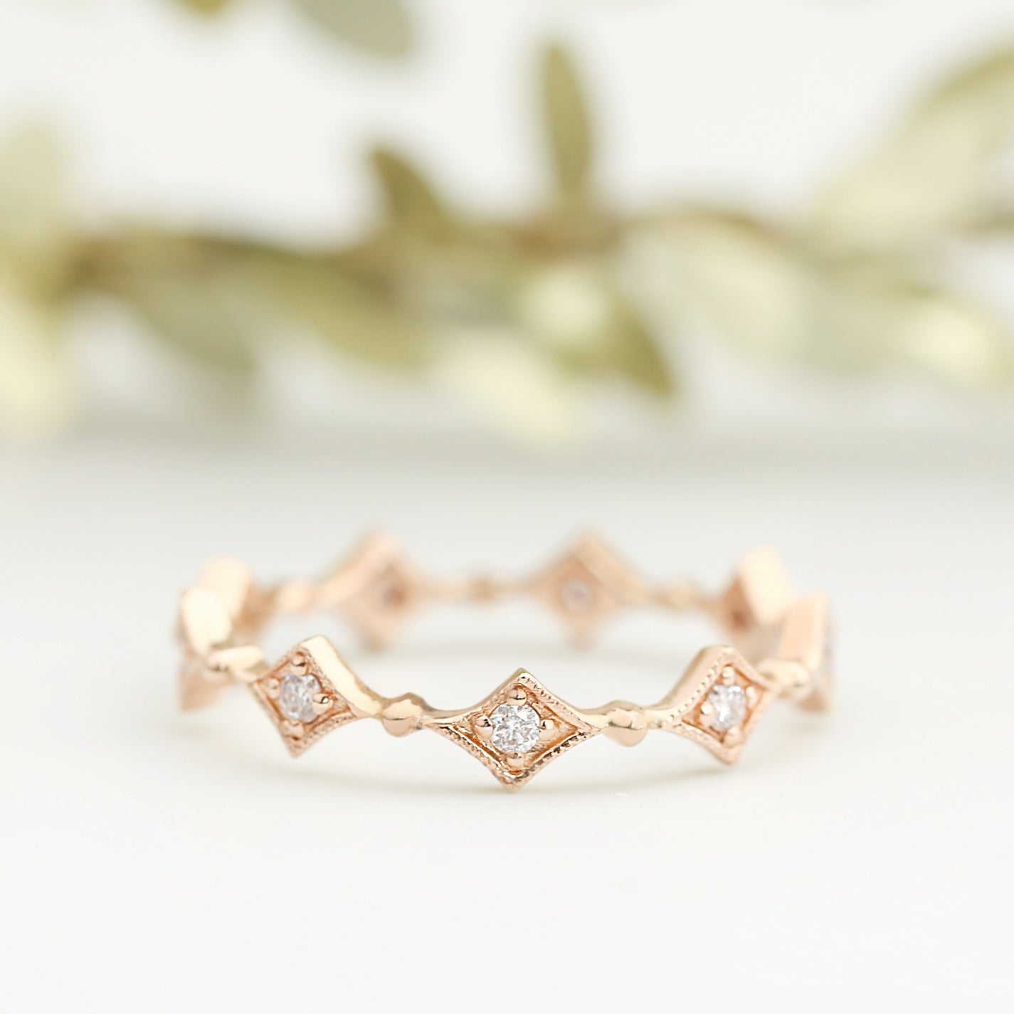 Rose gold star diamond eternity ring with natural white diamonds and ethical solid gold setting