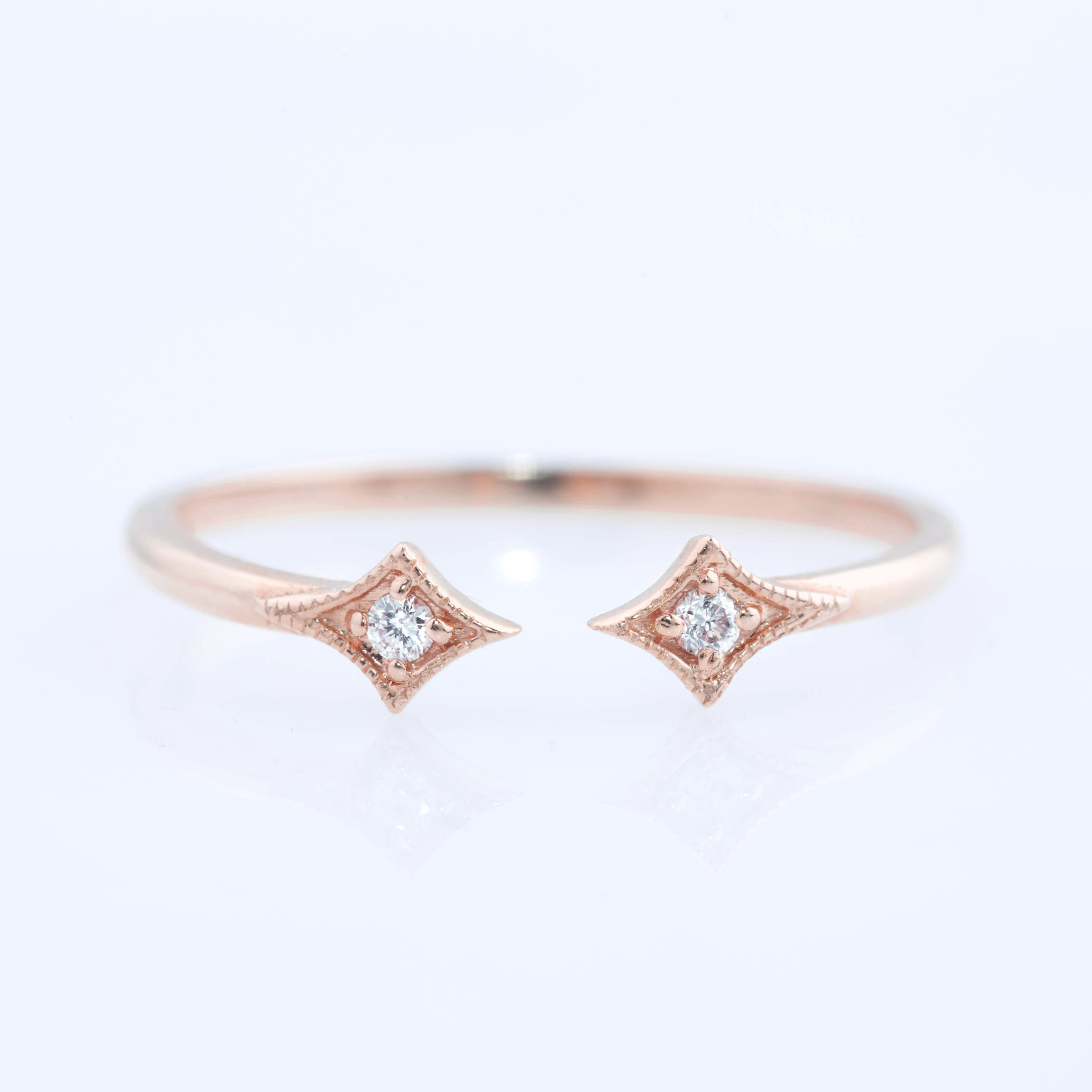 Rose gold double star open ring with natural white diamonds, brilliant cut, delicate 1.3mm band, ethically sourced materials.