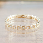 Hazel Eternity Ring in solid gold featuring natural white diamonds with G color and SI clarity in an eternity band design