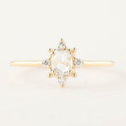 Gold Victoria Ring with 0.41ct oval rose cut diamond and white accent diamonds in low profile setting