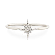 14k white gold starburst diamond ring with pave set diamonds on a slim 1.3mm band, size 7.5x9.0mm center design