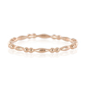 Rose gold Adina Ring with alternating bead and elongated shapes in a full eternity style band, 1.5mm width.