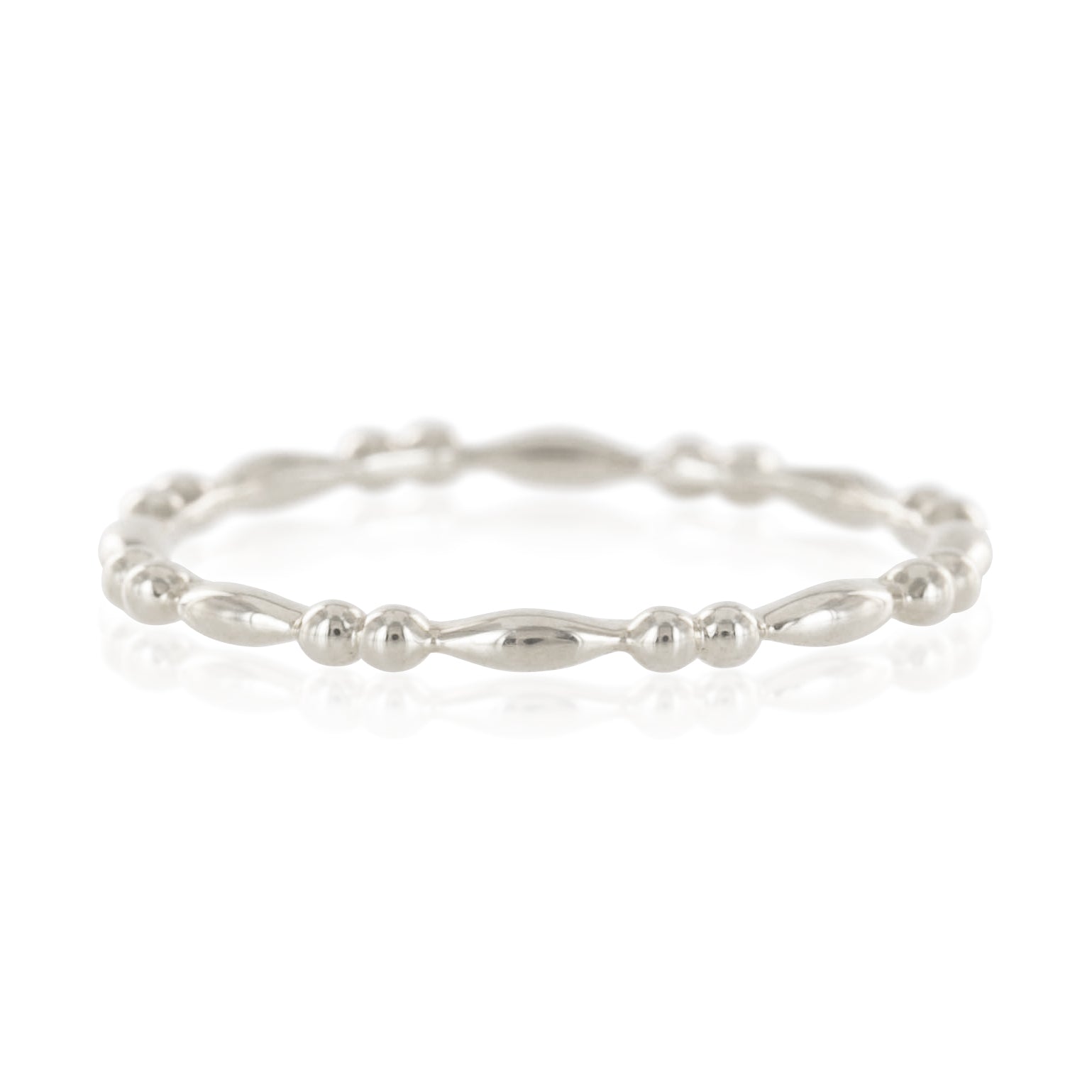 14k white gold beaded stacking ring with alternating round and elongated beads, delicate 1.5mm band design