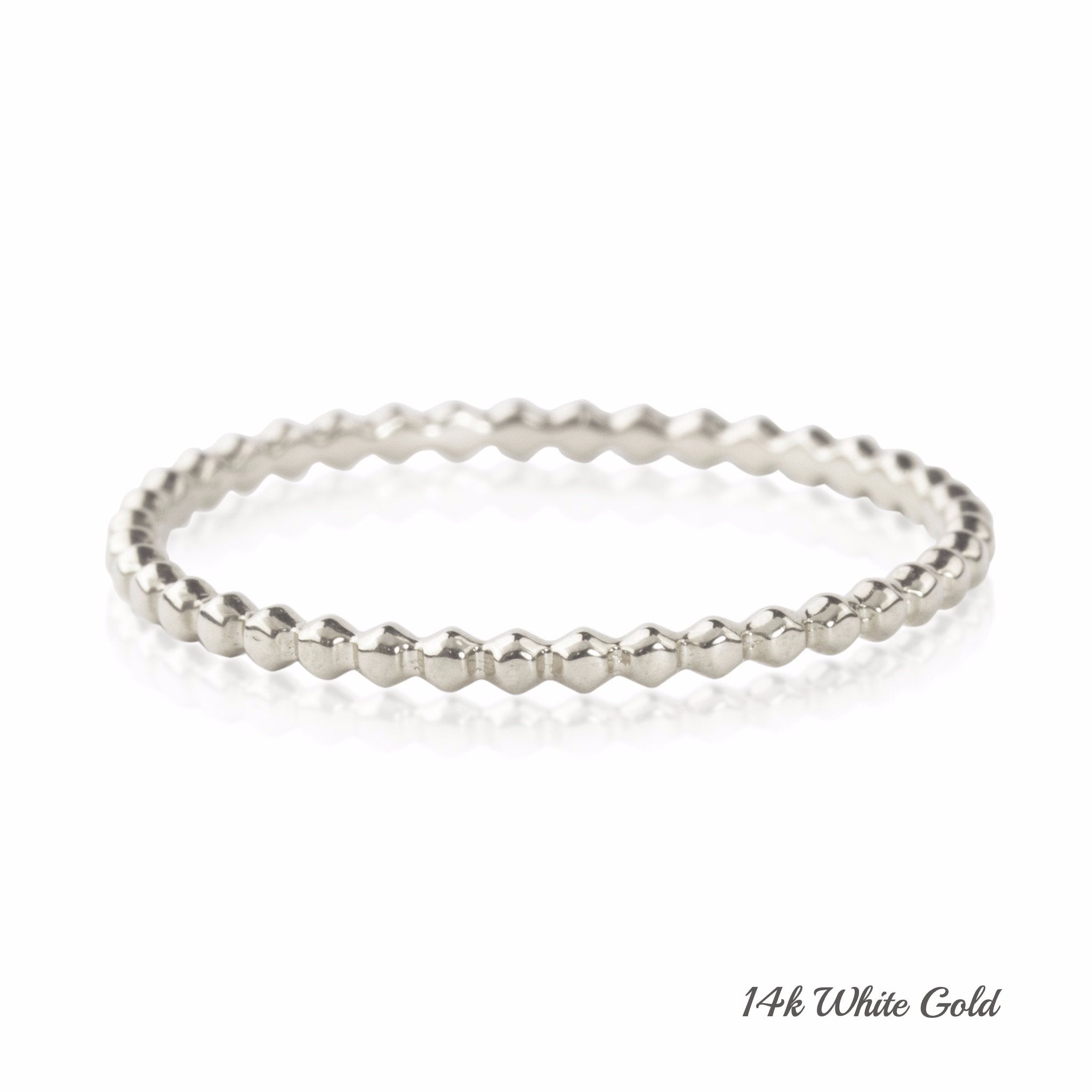 14k white gold bead eternity ring with 1.5mm band width displayed on white background