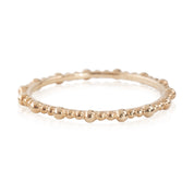 Solid gold full eternity Gemma Ring with a beaded design and 1.5mm band width, shown on white background.