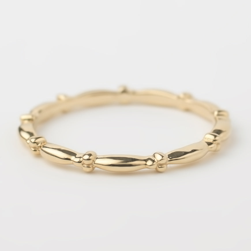 14k solid yellow gold beaded stacking ring with 1.5mm bandwidth, handmade and polished for a delicate look.