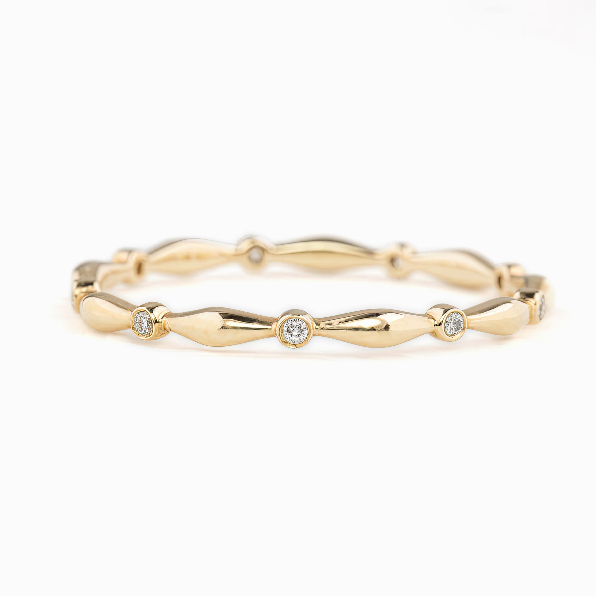 Elegant Aria Eternity Ring featuring natural white diamonds set in a 1.5mm solid gold band in full eternity style.