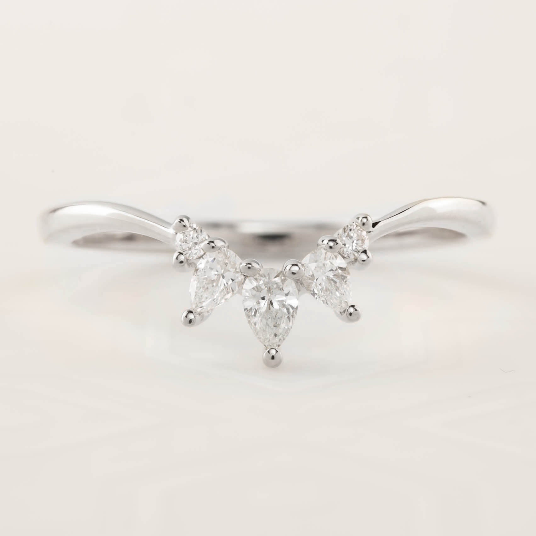 Gloria Ring featuring natural white diamonds set in a delicate, ethically sourced solid gold band.