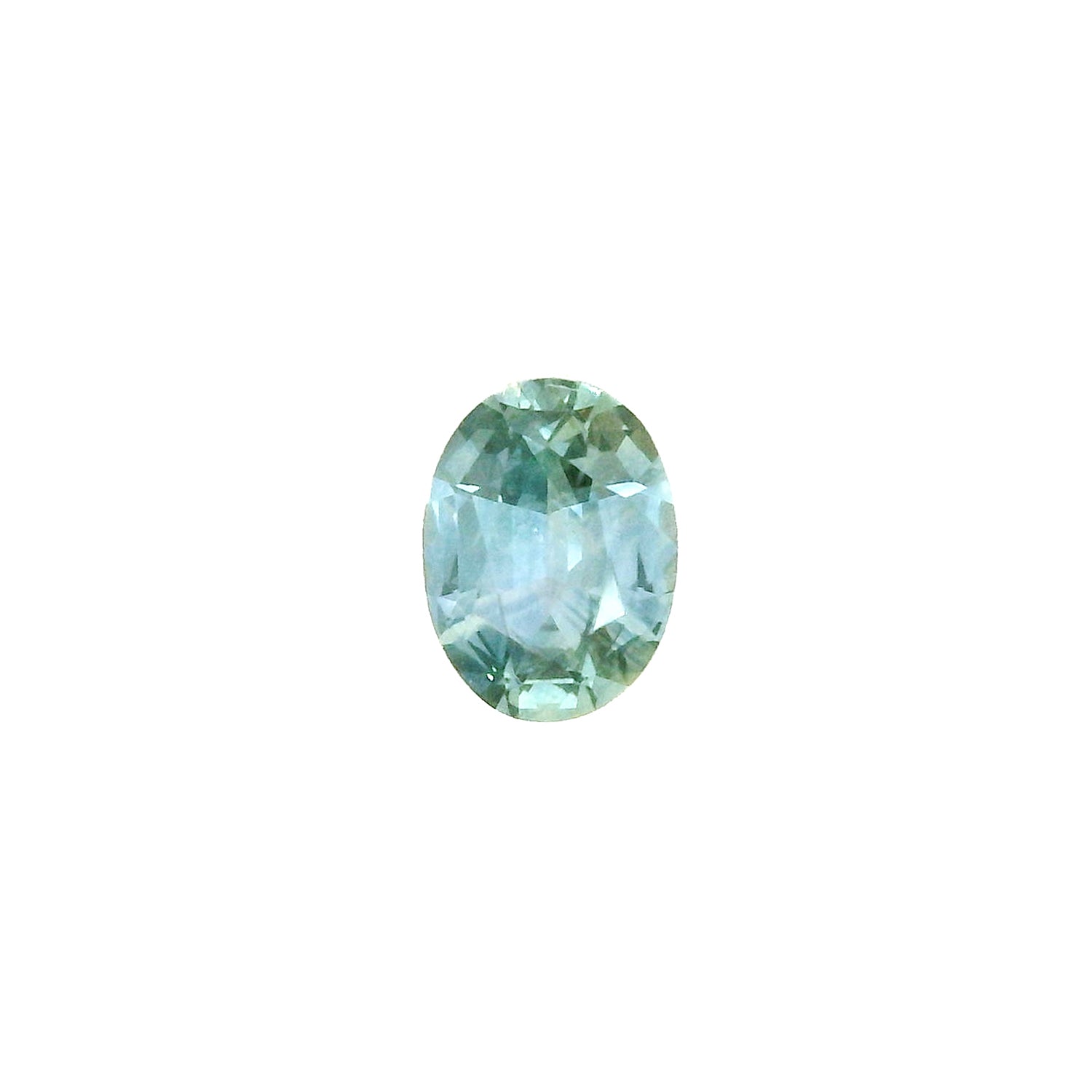 An oval-cut teal blue Montana Sapphire with visible inclusions under magnification.