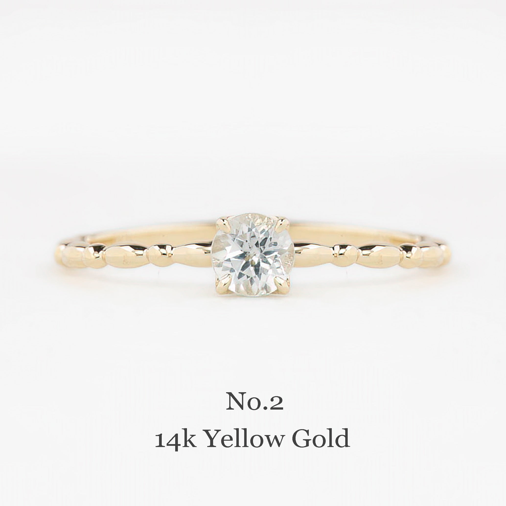 Gold ring with a diamond on a white background, labeled 'No.2 14k Yellow Gold'.