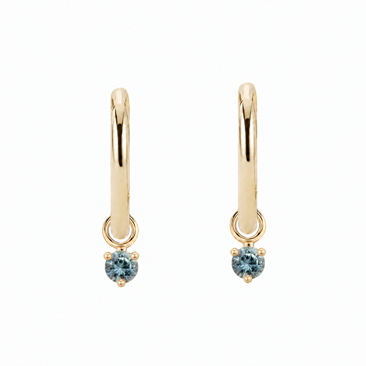 14K yellow gold hoop earrings with 3mm blue-green Montana sapphires in 3-prong settings