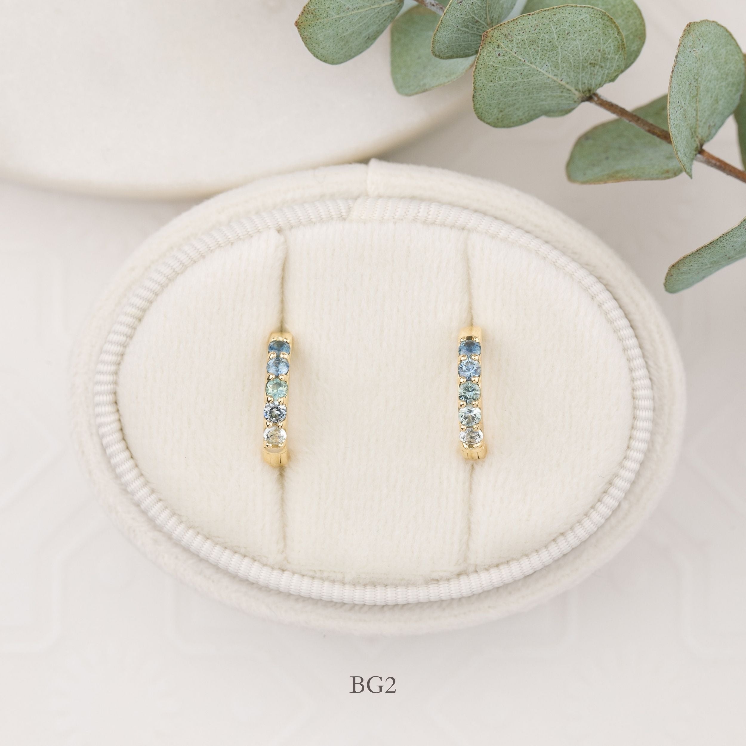 14K yellow gold Montana sapphire huggie earrings with blue sapphires, 12.5mm