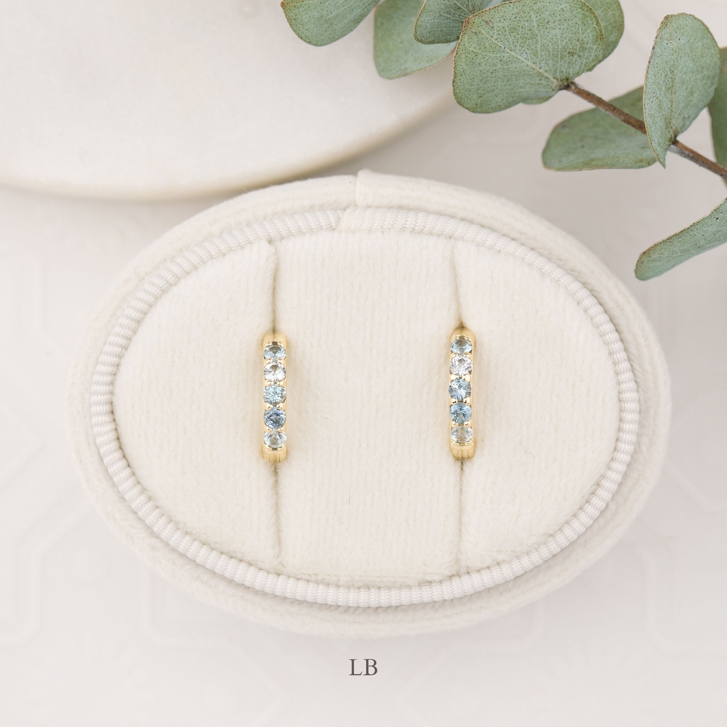 14K yellow gold Montana sapphire huggie earrings with blue sapphires, 12.5mm