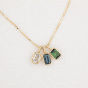 Patia Emerald-Cut Montana Sapphire Charm