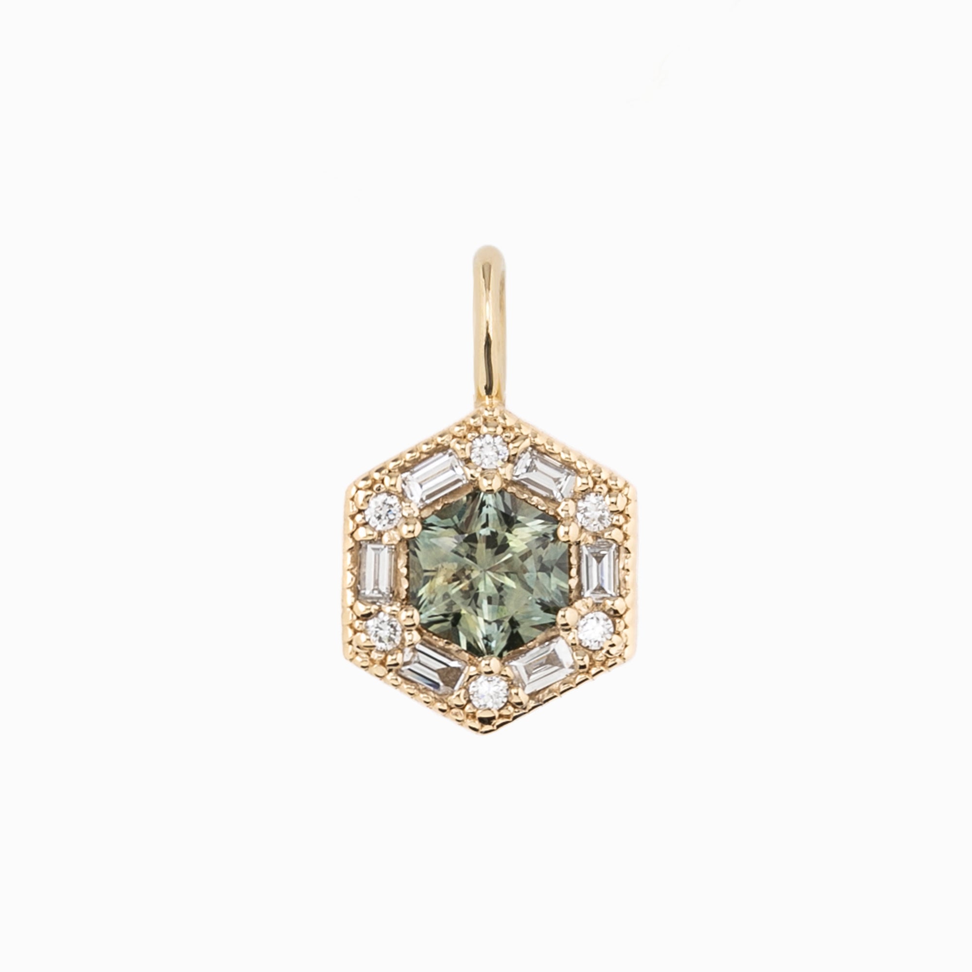 Hexagonal gemstone pendant with gold frame and clear stones on a white background