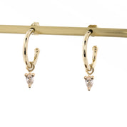 14K yellow gold hoop earrings with pear-cut natural diamond charms