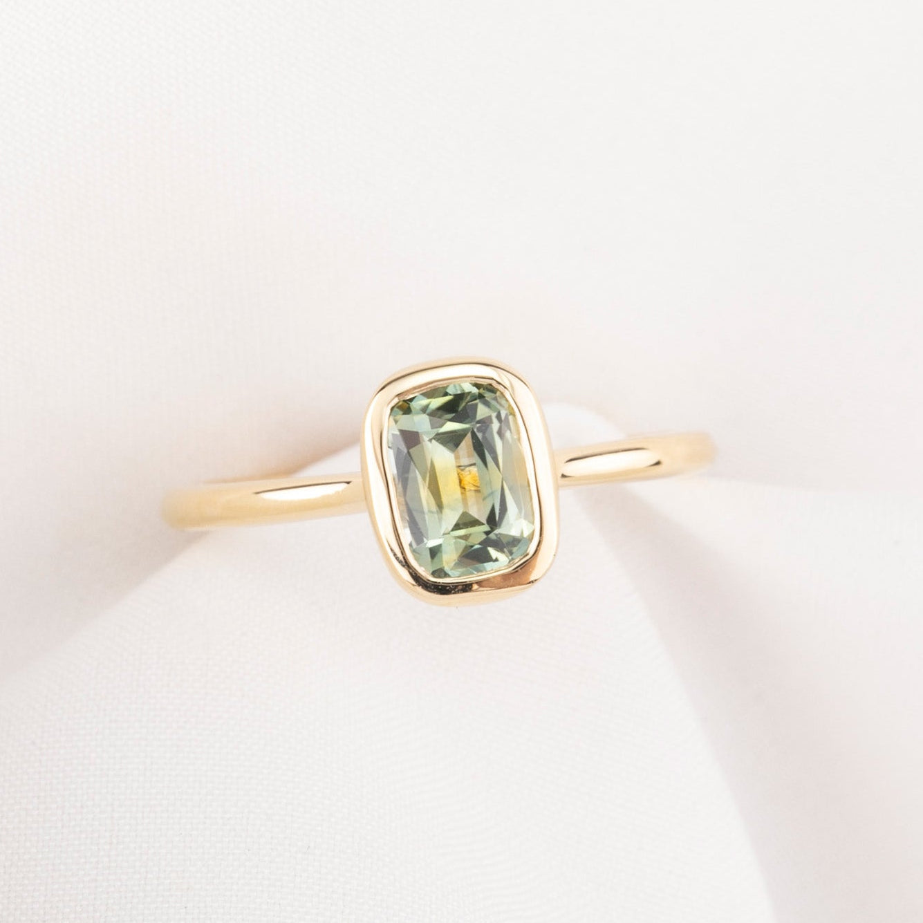 Riley Ring, 1.10ct Light Green Montana Sapphire