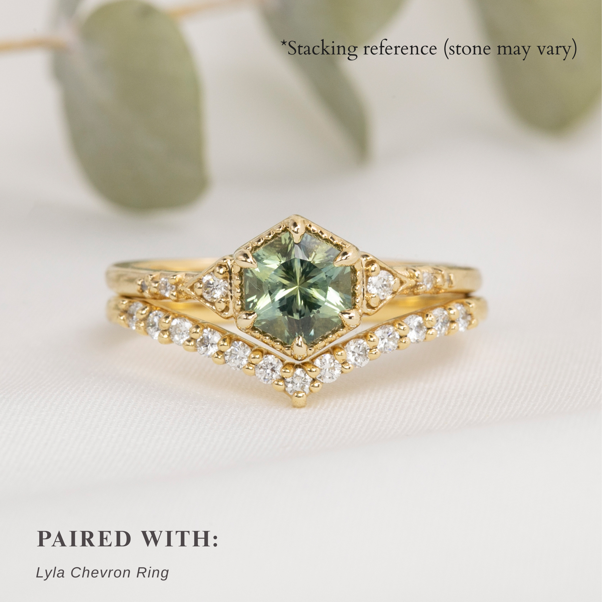 Stacking reference of a similar sapphire ring paired with a nesting diamond band (Lyla Chevron Ring)