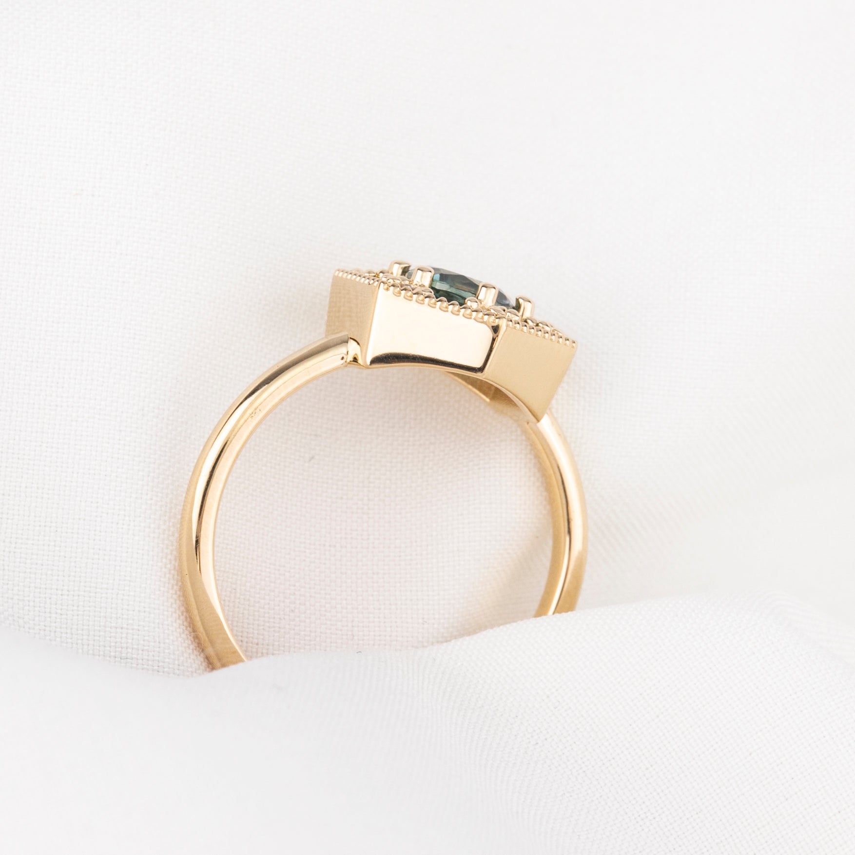 Lila Solitaire Ring, 0.87ct Teal Blue Montana Sapphire