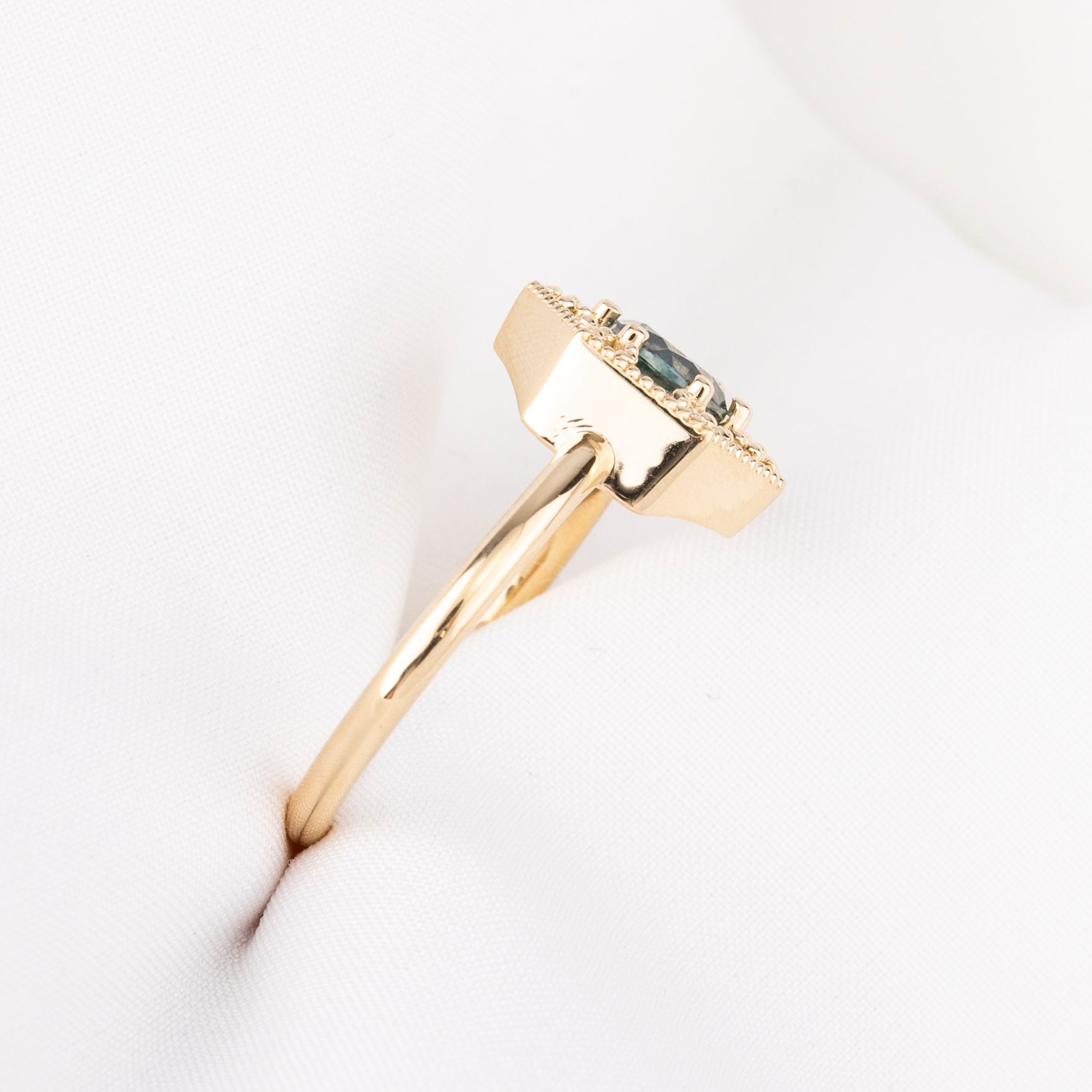 Lila Solitaire Ring, 0.87ct Teal Blue Montana Sapphire