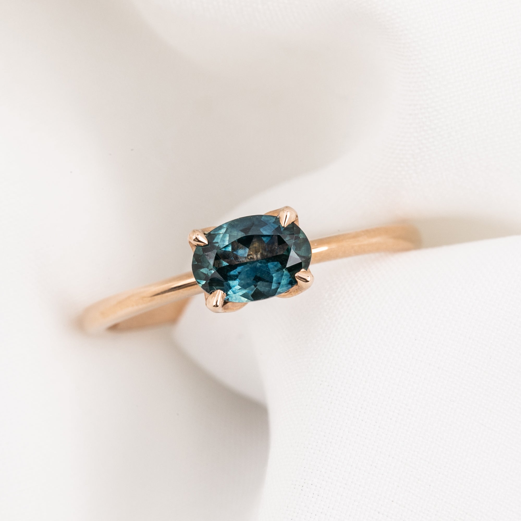 Sara Ring 0.86ct Blue Green East West Oval Montana Sapphire, 14k Rose Gold (One of a kind)