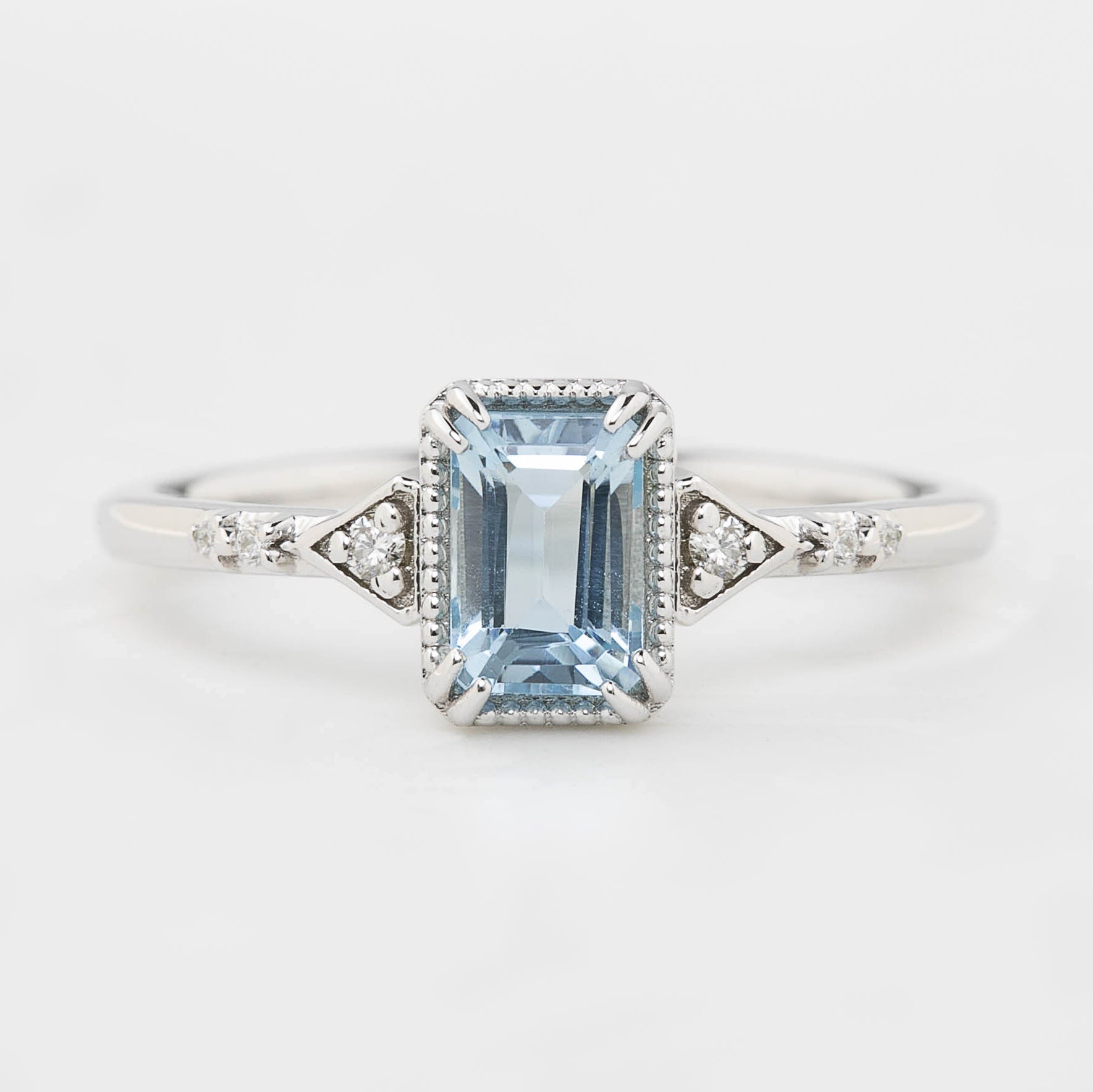 Agatha Ring 0.60ct Emerald Cut Aquamarine