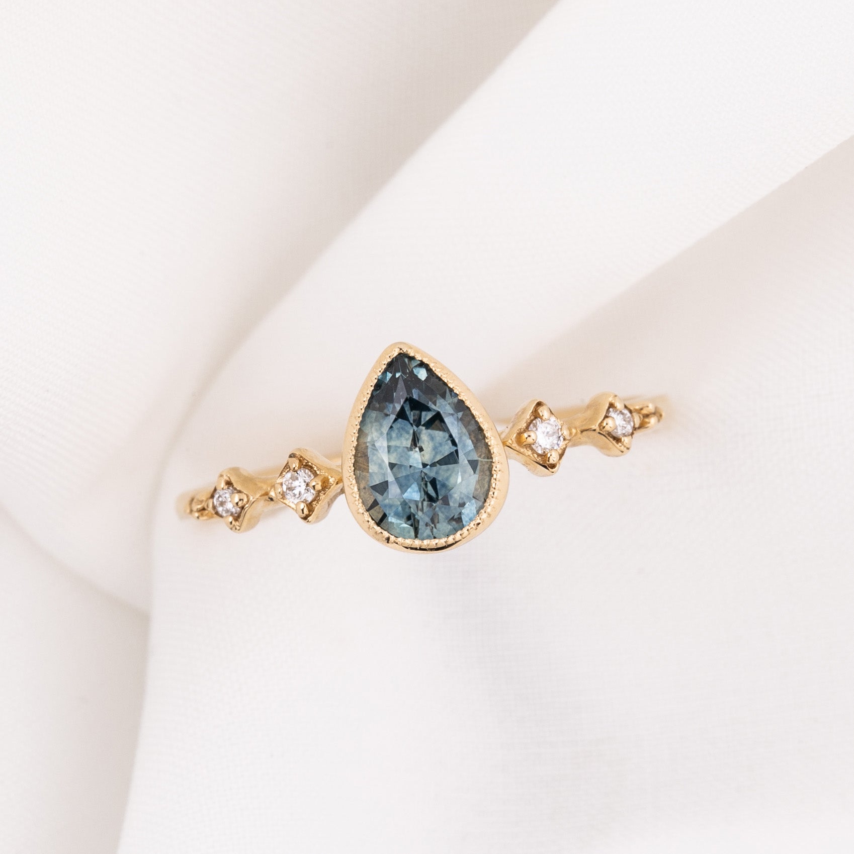 【一点物】セレステリング ・0.89ct・加熱モンタナ産ブルーグリーンサファイア・K14YG