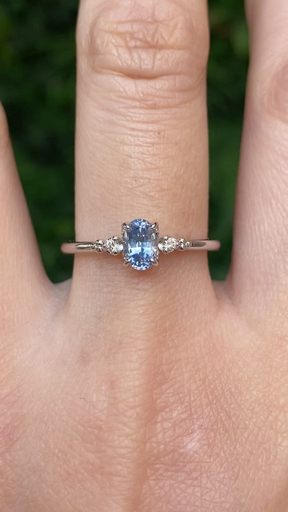 Estel Ring featuring a 0.60ct blue-green oval Montana sapphire and natural diamond accents in 14k white gold