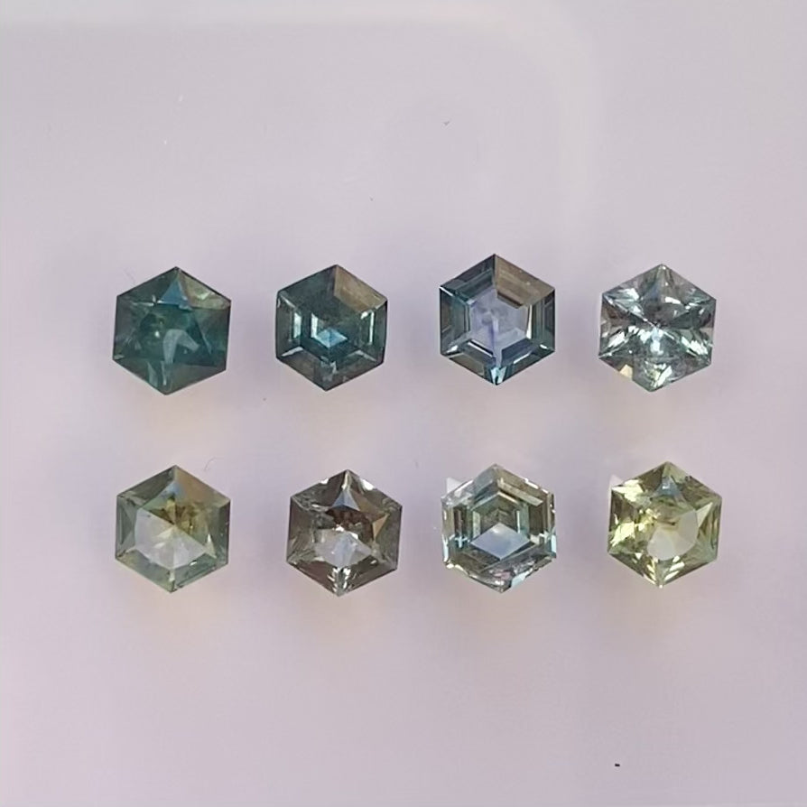 0.60ct Calibrated Hexagon Montana Sapphire with different shades of blue and greens
