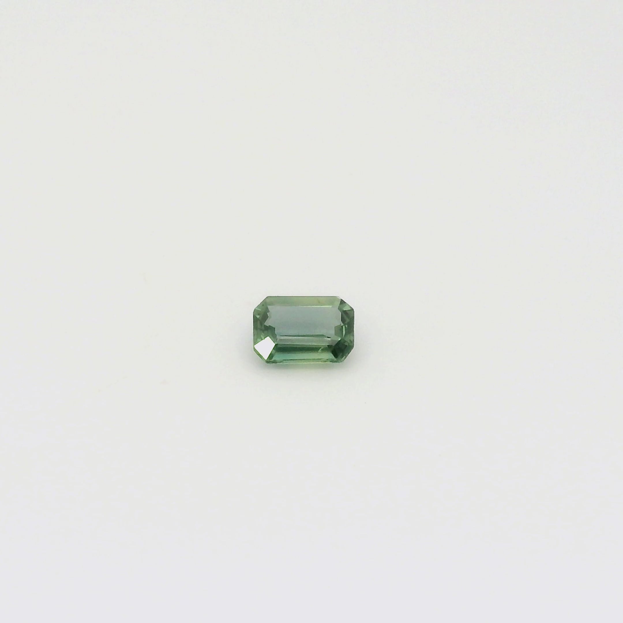1.09ct Emerald Cut Green Madagascar Sapphire SF521