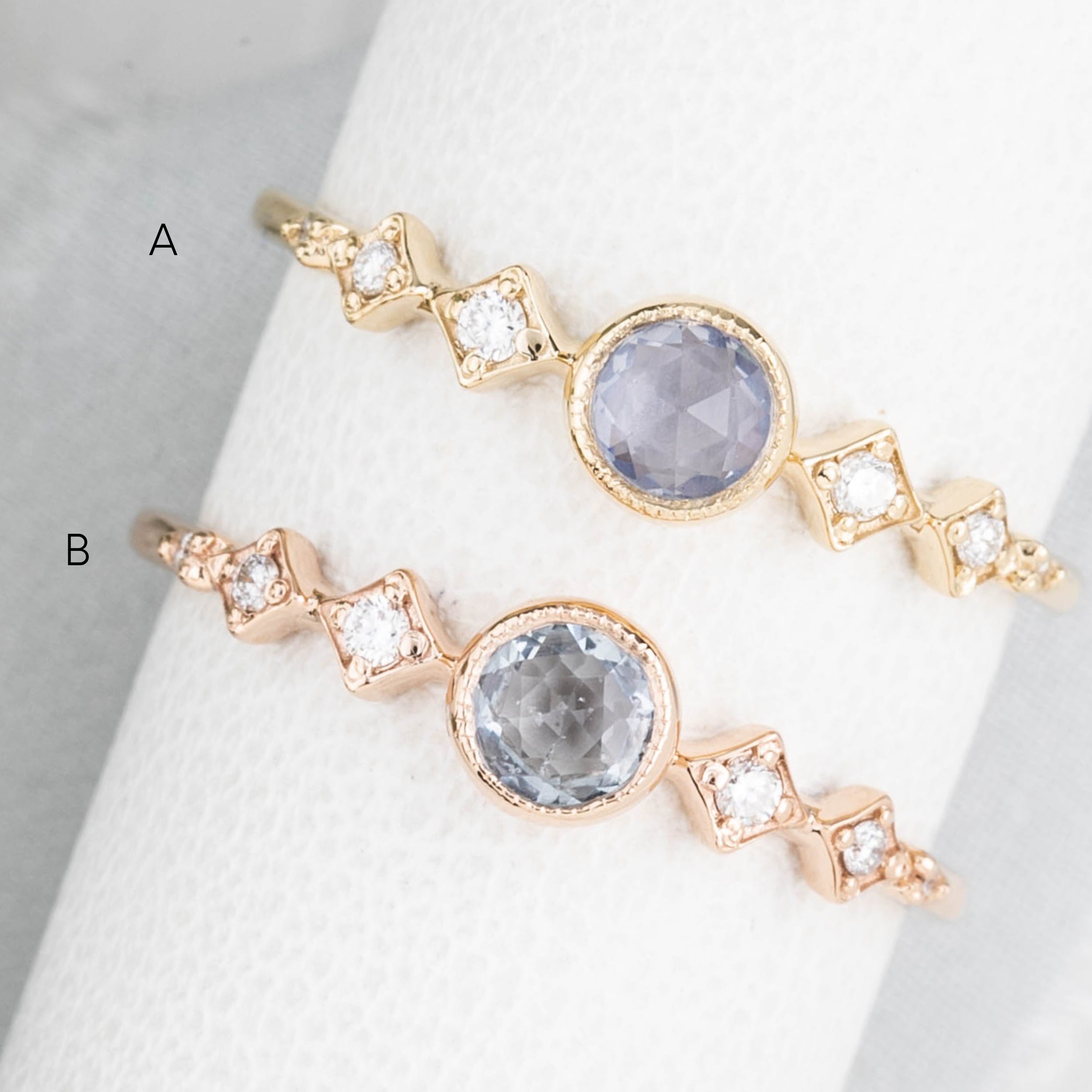 Two Celeste rings, 0.25ct Round Unheated Sapphire set in 14k gold with natural accent diamonds