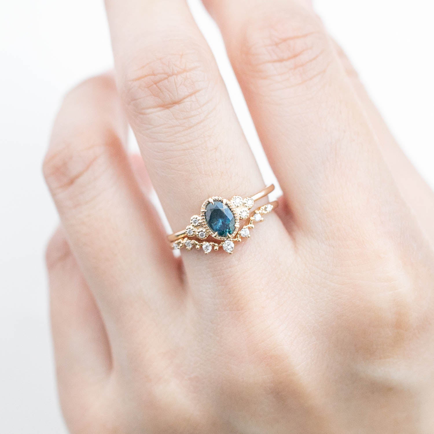 Celine Ring, 0.60ct Blue Green Montana Sapphire