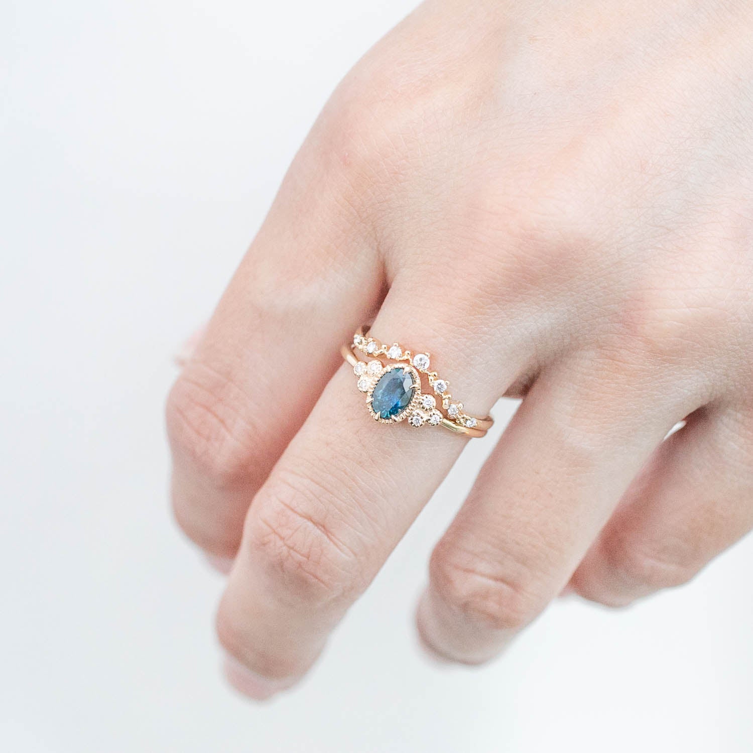 Celine Ring, 0.60ct Blue Green Montana Sapphire