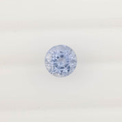 2.06ct round cut Ceylon blue sapphire with light blue color and eye-clean clarity, ethically sourced from Sri Lanka