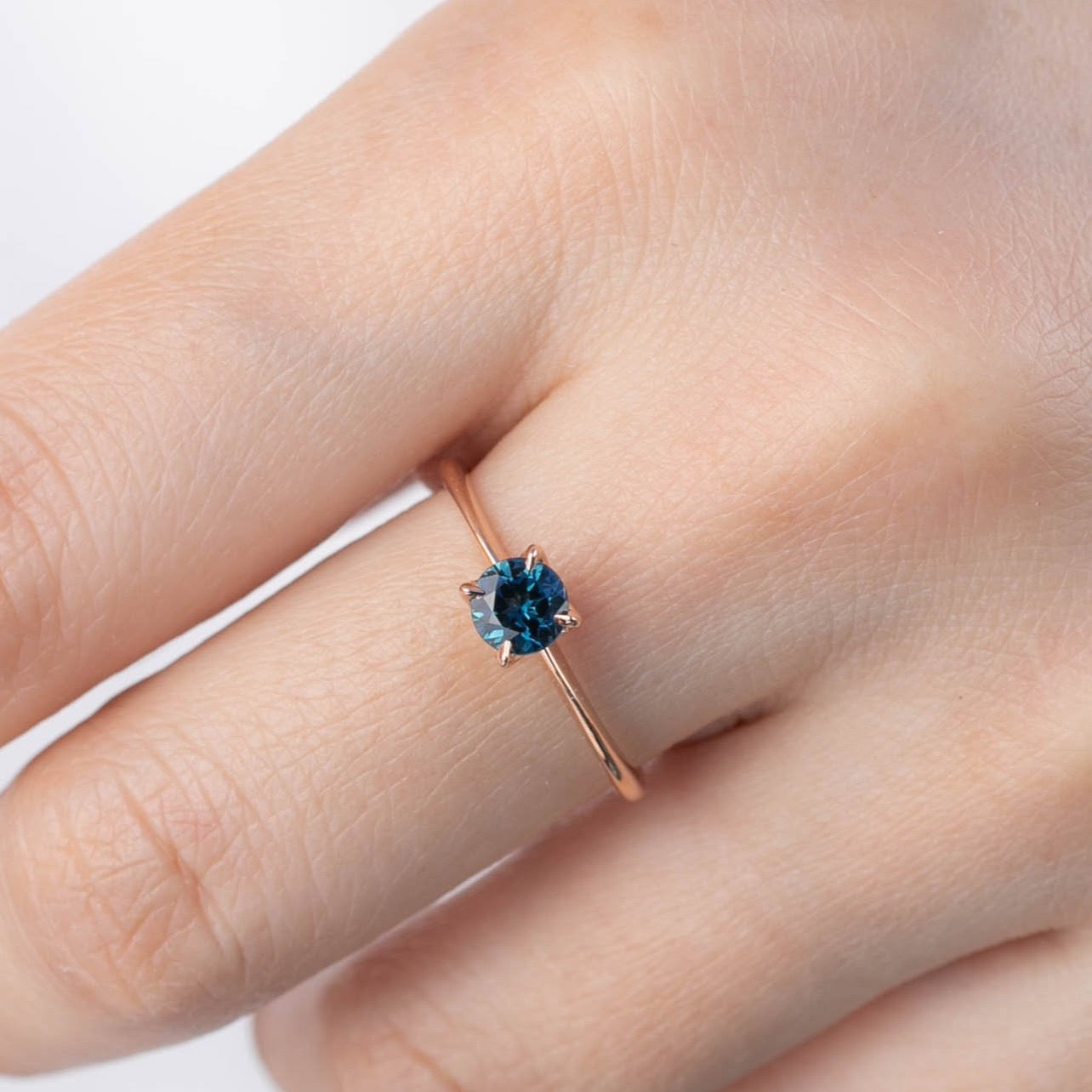 Sara Ring - 4.8mm 0.55ct Teal Blue Queensland Sapphire, 14k Rose Gold