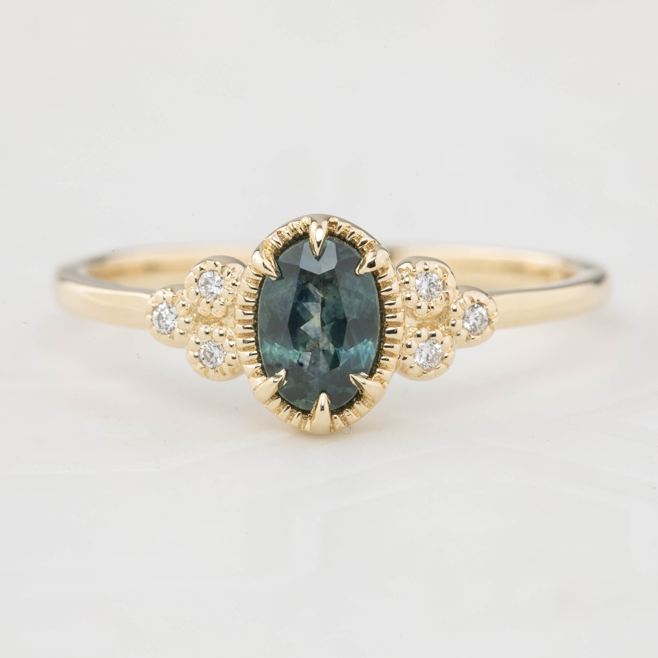 Celine Ring, 0.60ct Blue Green Montana Sapphire
