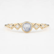 Celeste Ring, 0.25ct Round Unheated Sapphire set in 14k yellow gold with natural accent diamonds