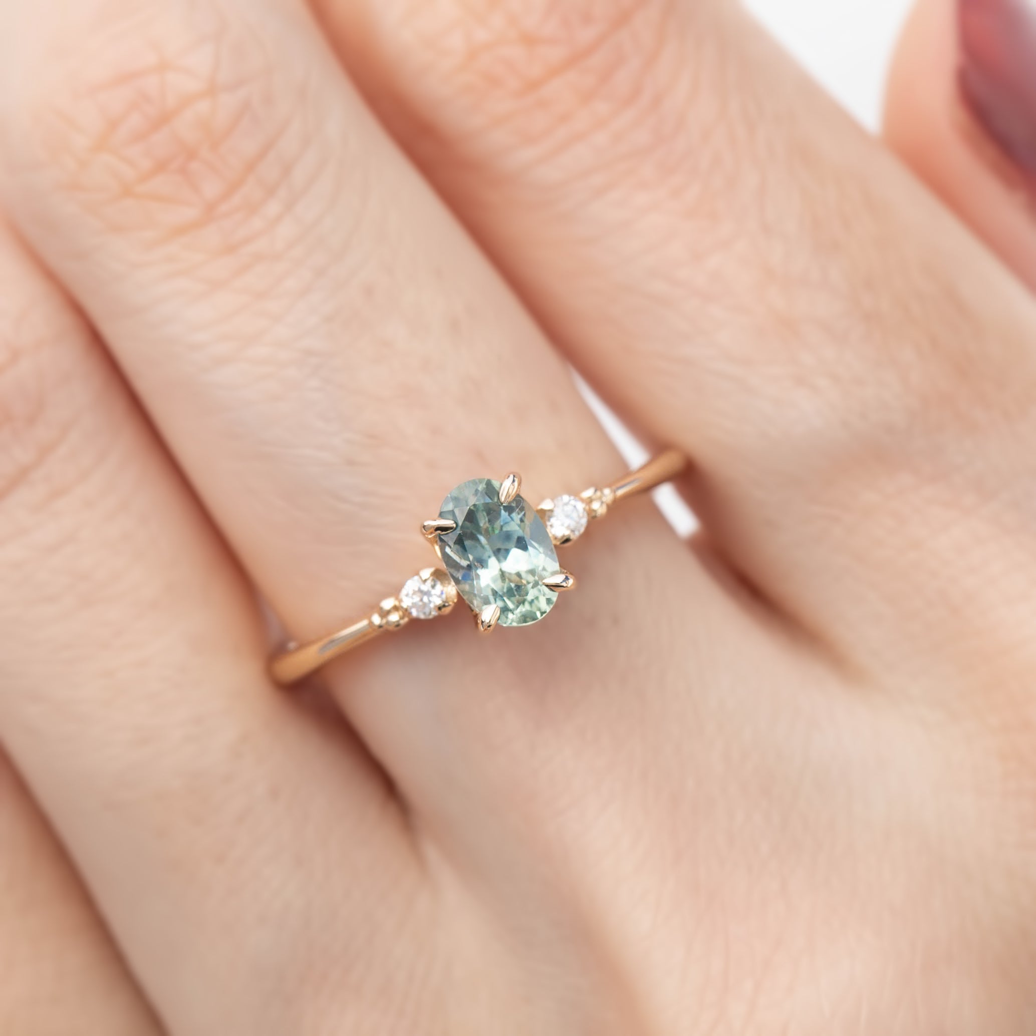 【一点物】エステルリング ・0.85ct・加熱モンタナ産アクアグリーンサファイア・K14YG